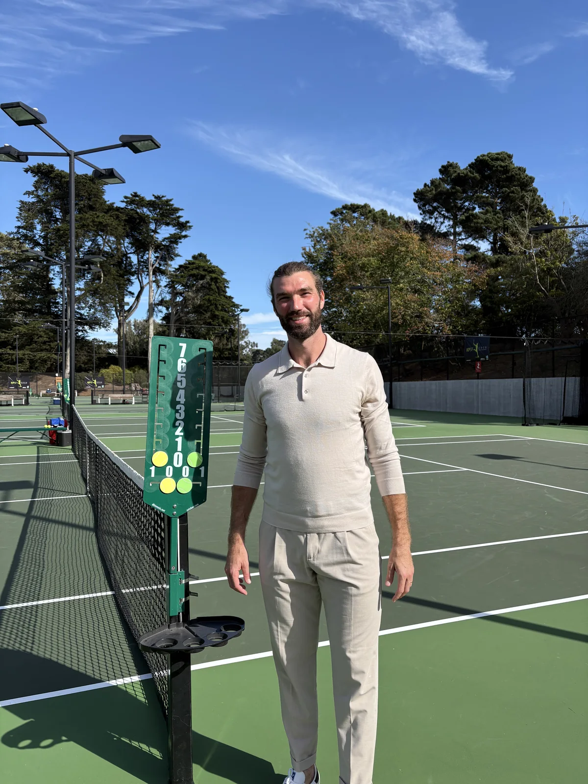 Elmar Ejupovic on a tennis court